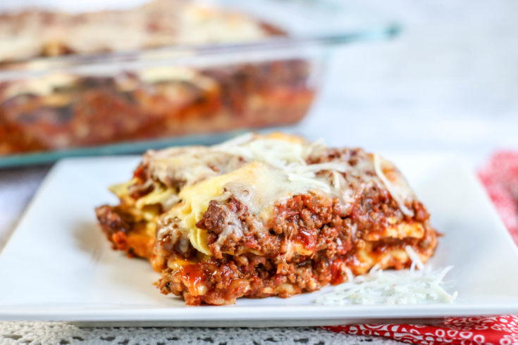 Layers of cheese ravioli, ground beef, marinara sauce and cheese baked in a casserole dish